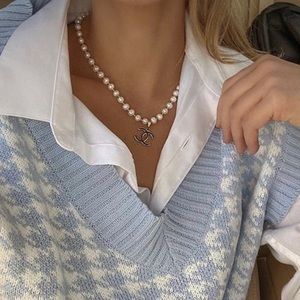 blue houndstooth sweater vest